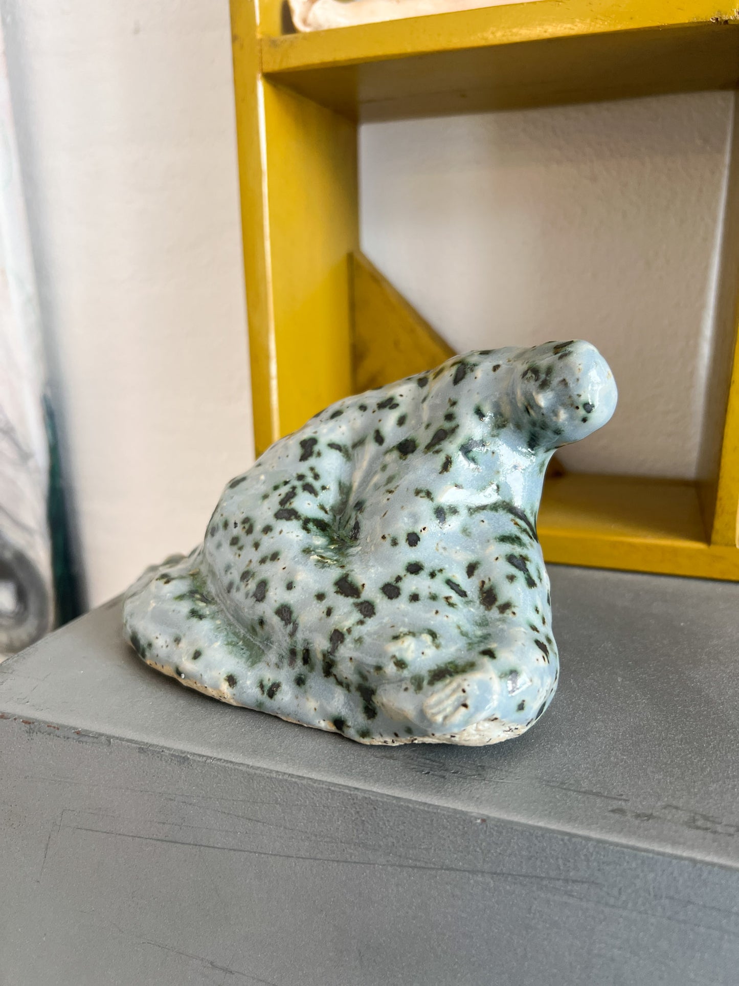 A Sitting Human - stoneware sculpture